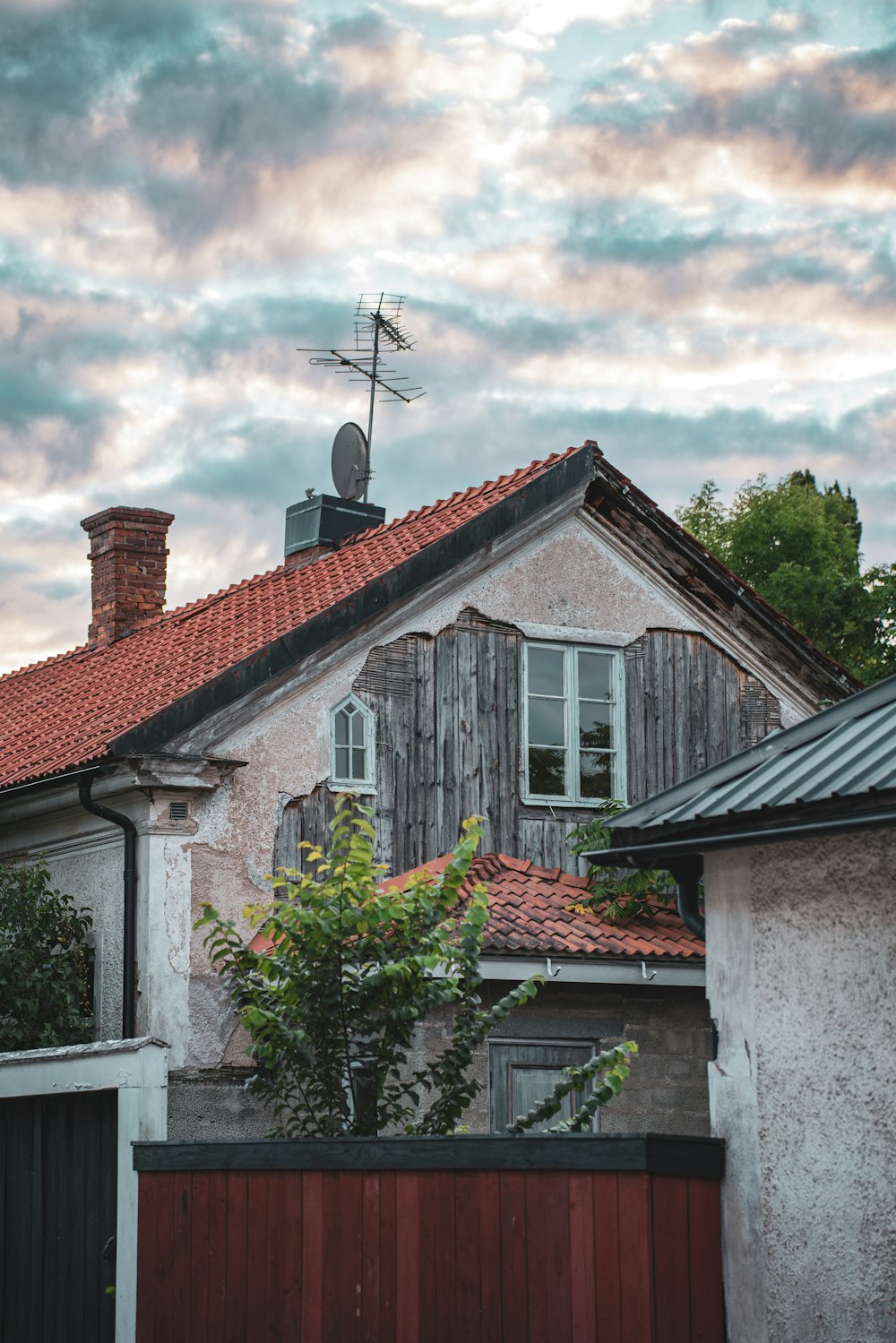 a house with a satellite dish on top