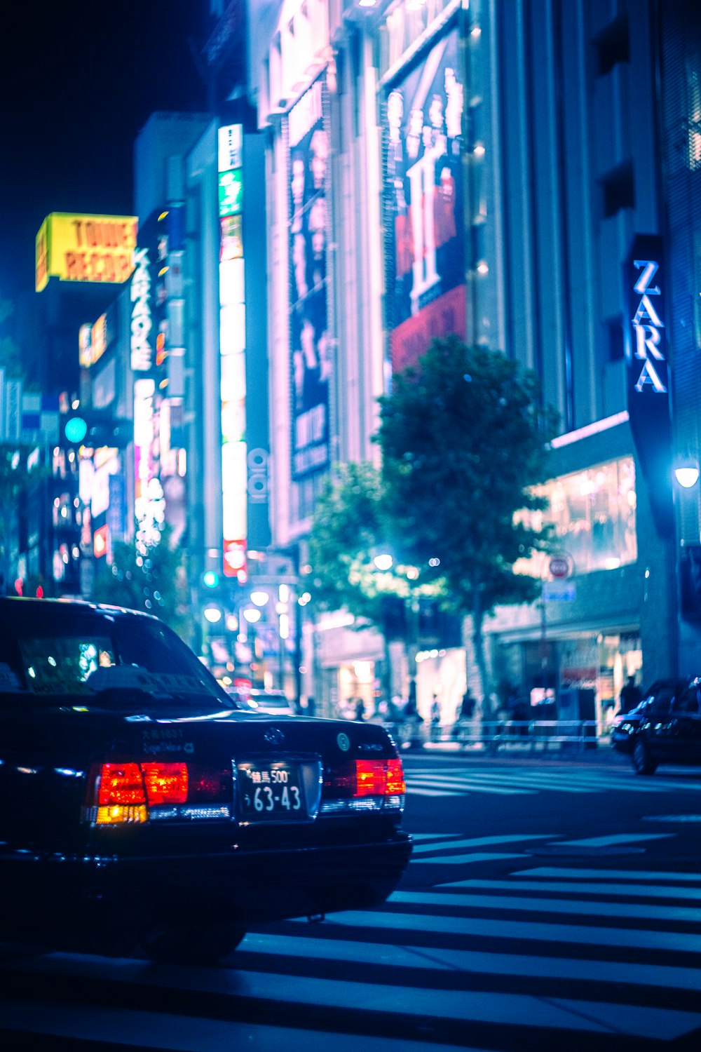 a car driving through a city