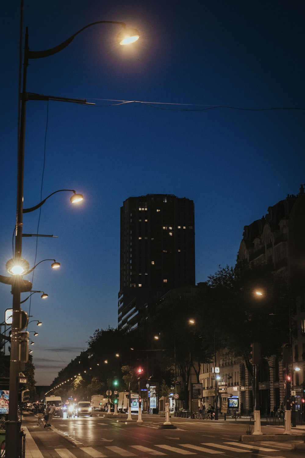 a street with street lights and buildings