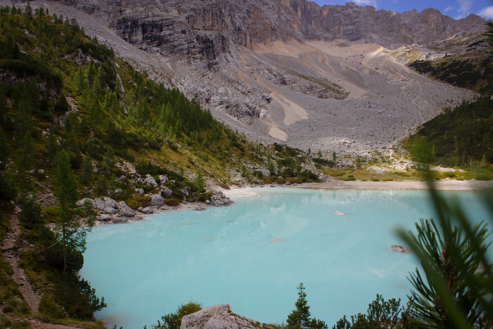 a body of water surrounded by mountains