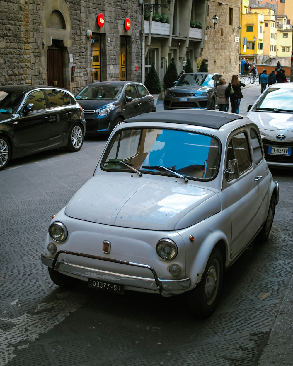 a car parked on the side of a street