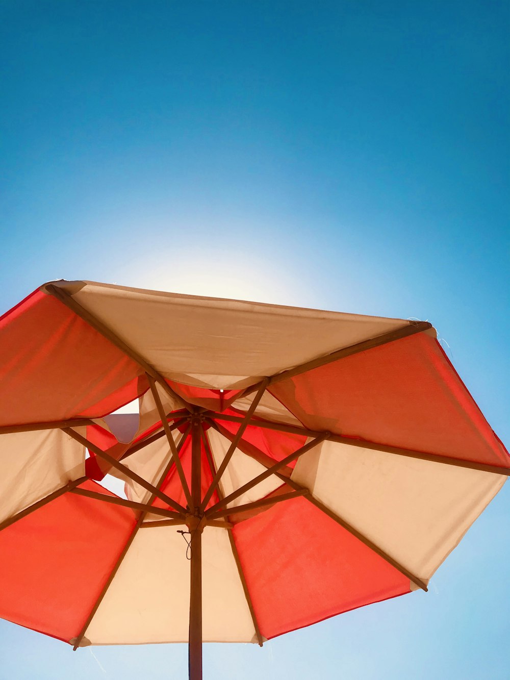 a red and white umbrella