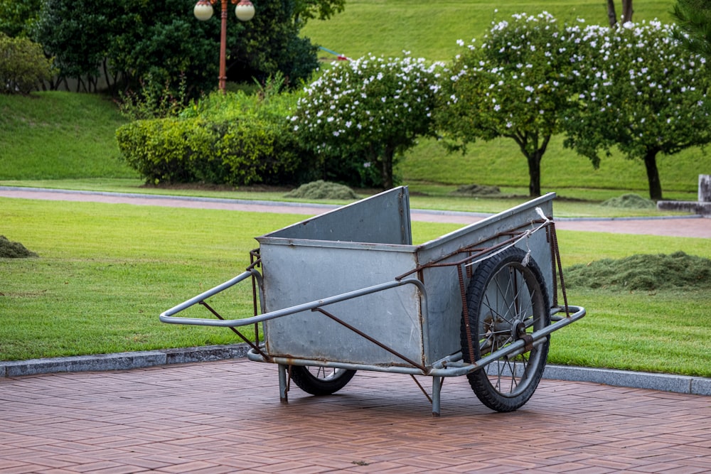 a carriage on a brick path