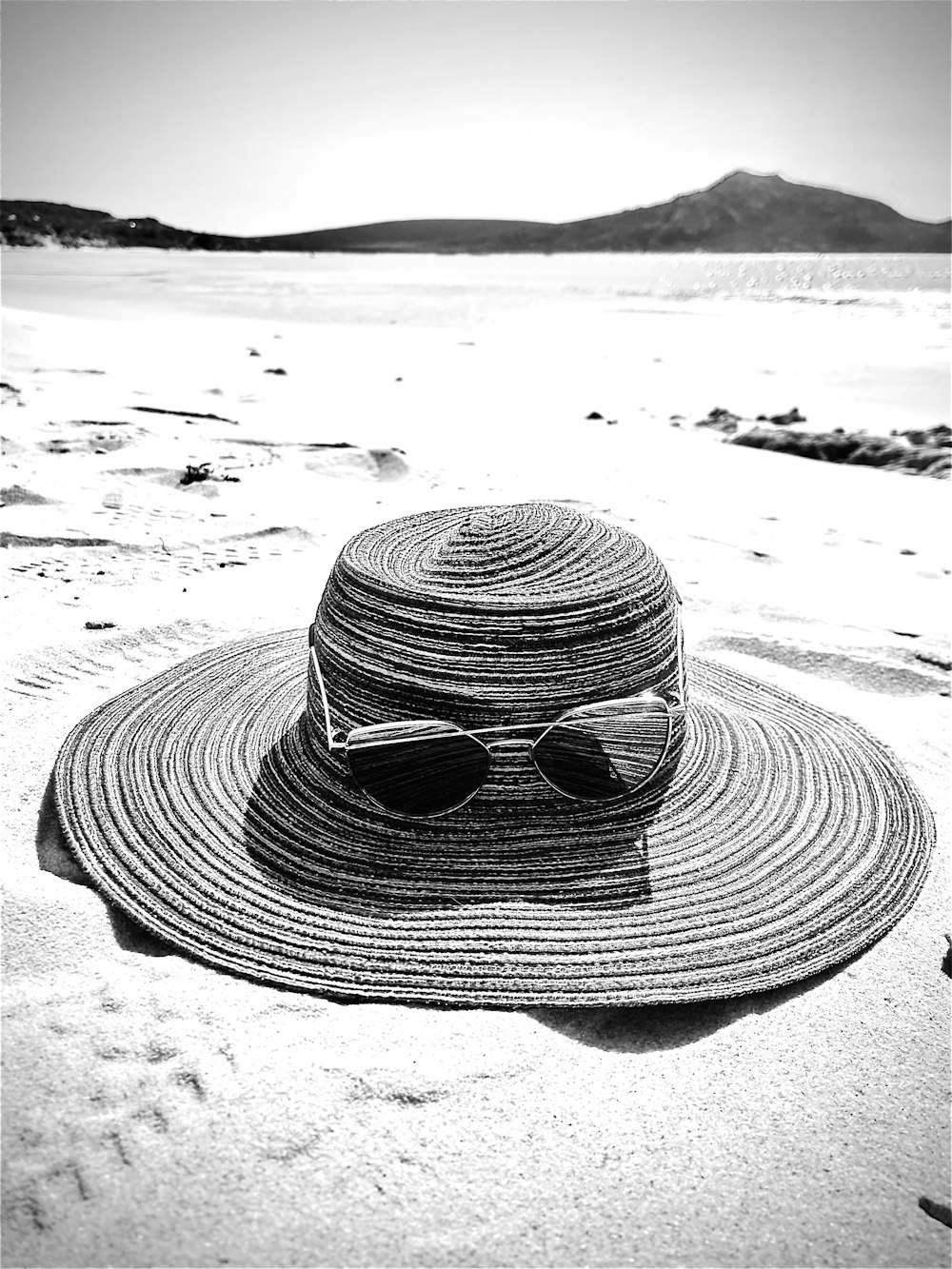 a hat on a beach