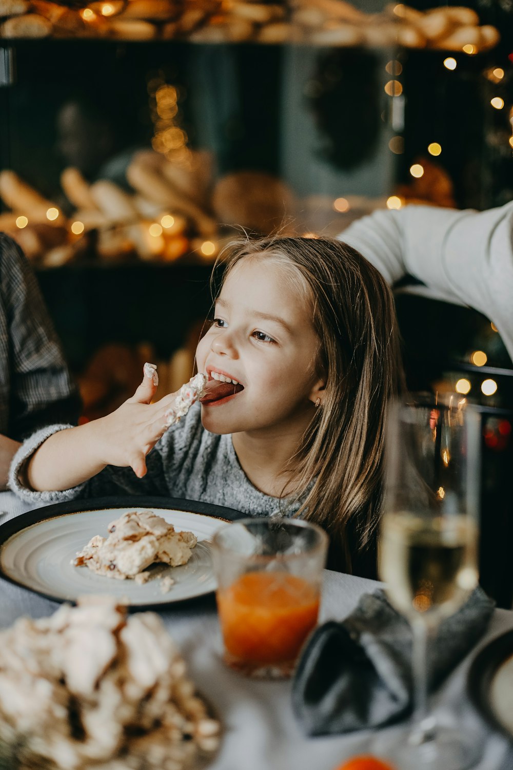 a person eating food at a restaurant