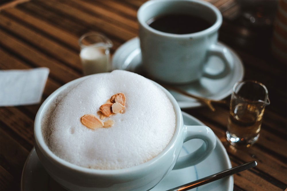 a cup of coffee and a spoon