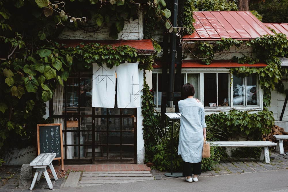 a person walking down a sidewalk