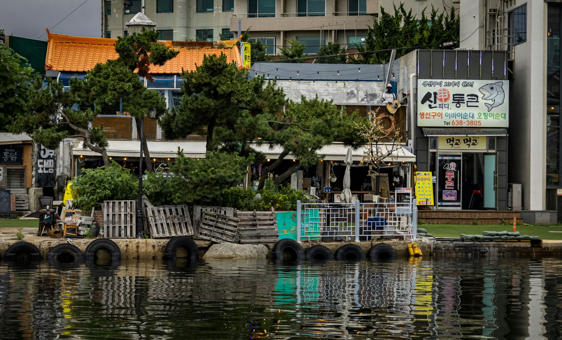 a body of water with buildings along it