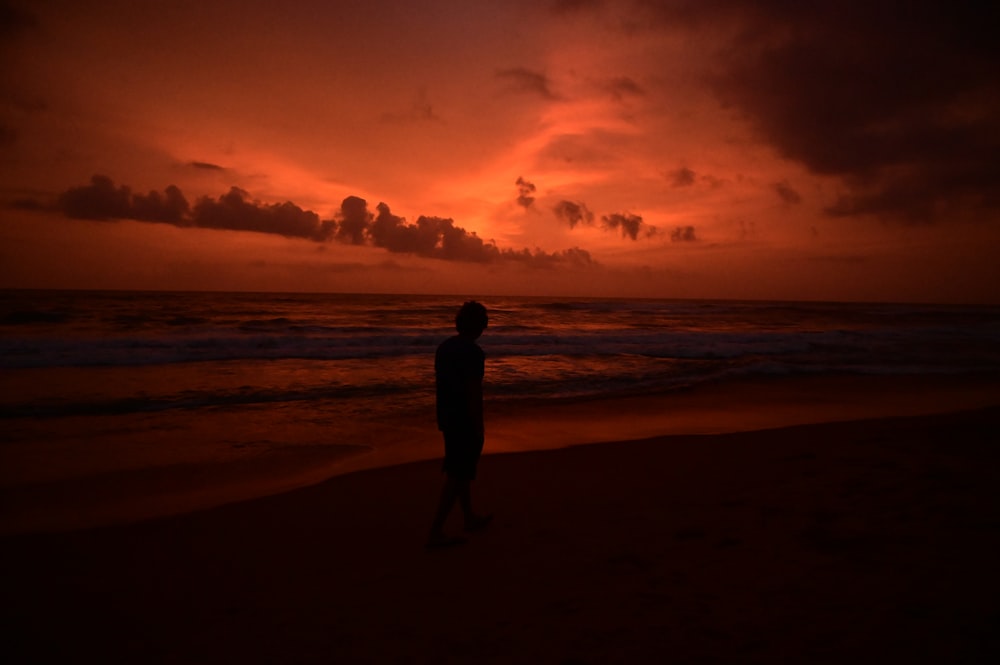 a person standing on a beach