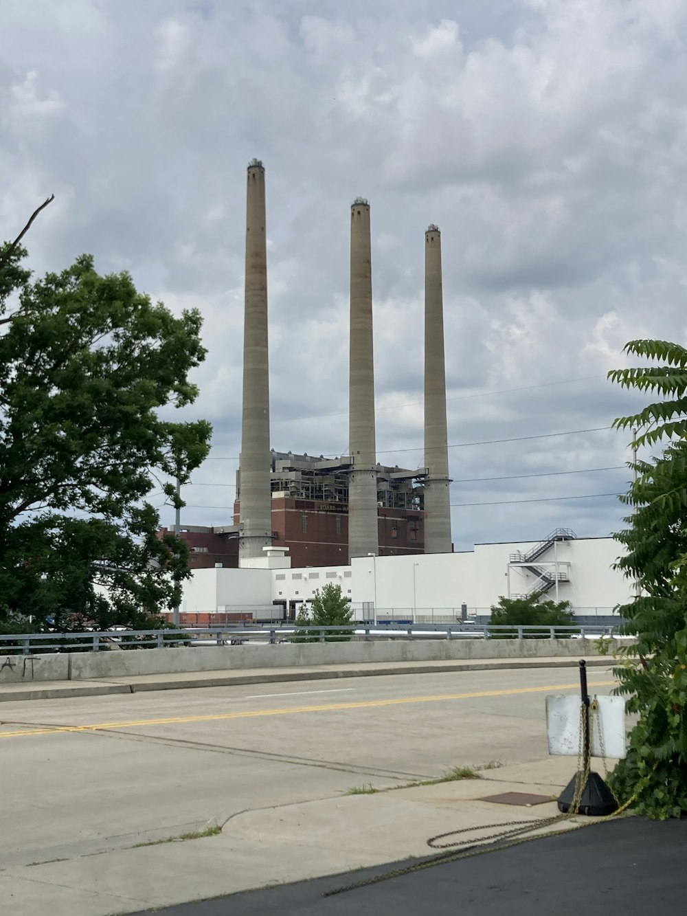 a group of tall smokestacks