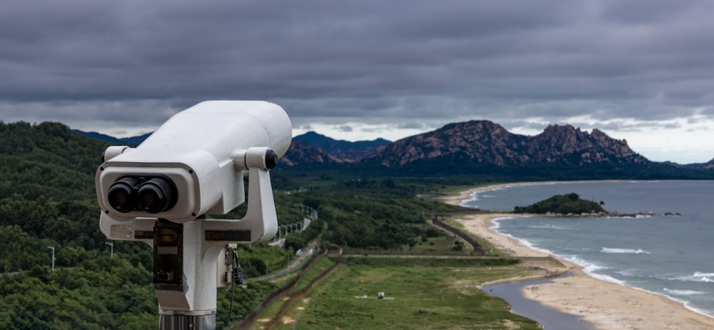 a telescope overlooking a beach