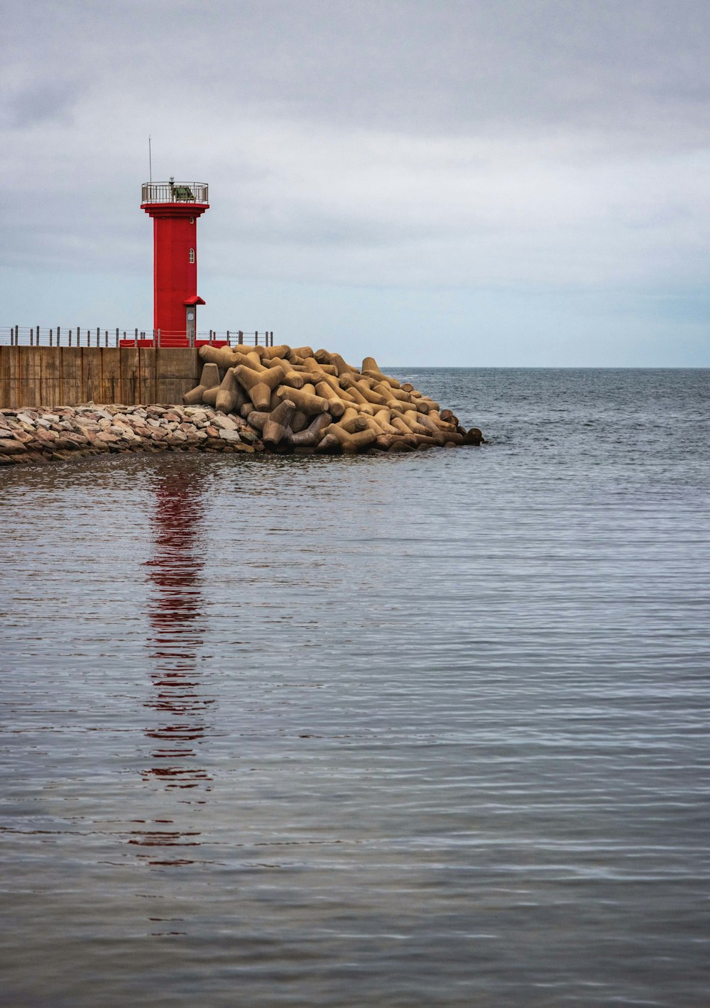 a lighthouse on a rocky island