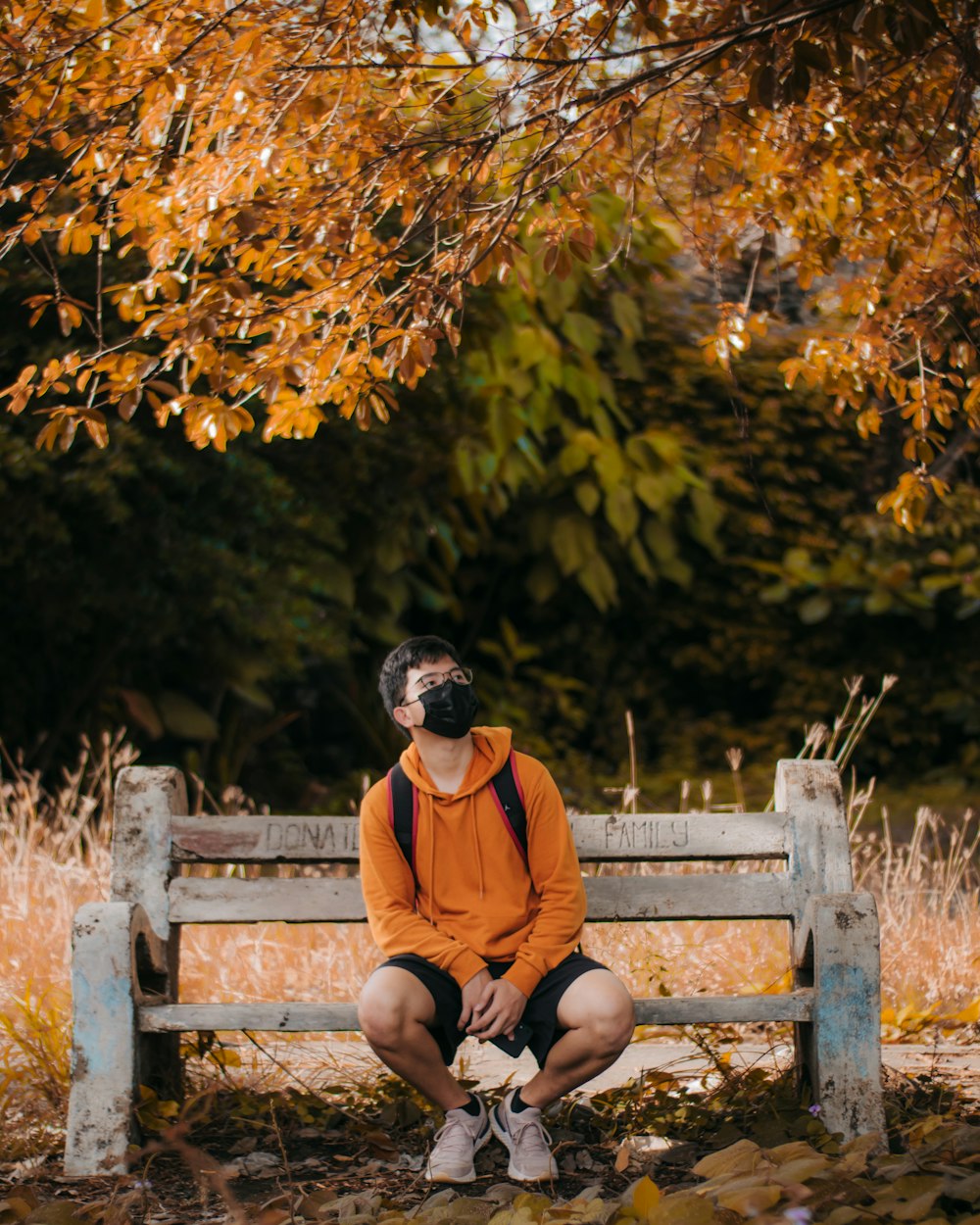 a person sitting on a bench