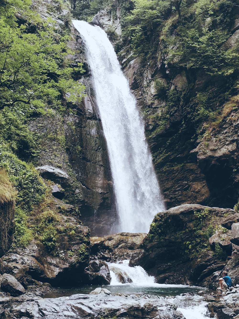 a waterfall in a rocky area