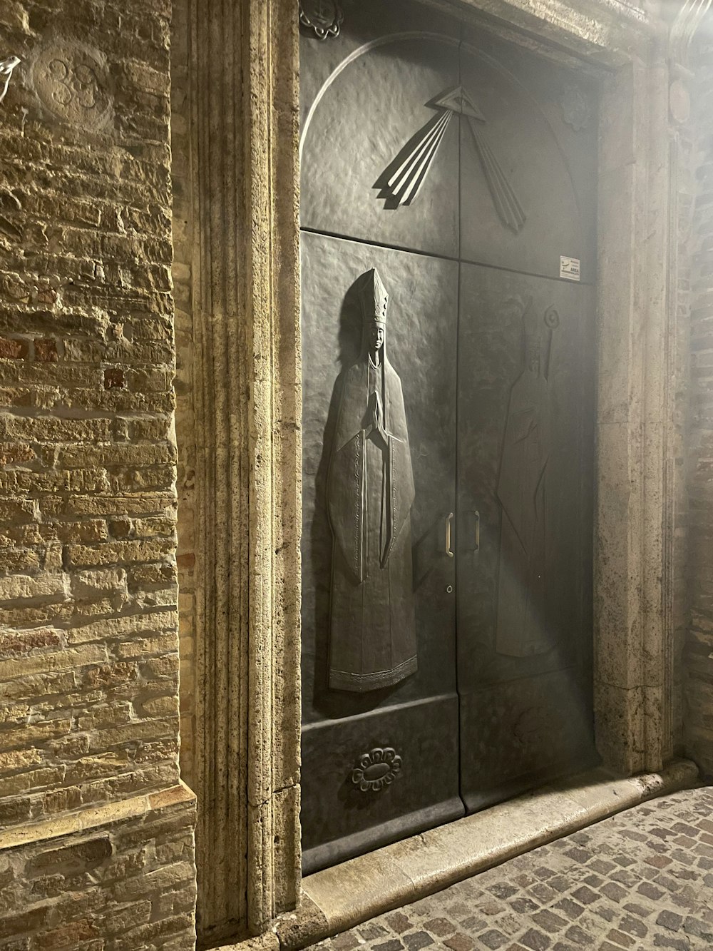 a door with a statue on the door