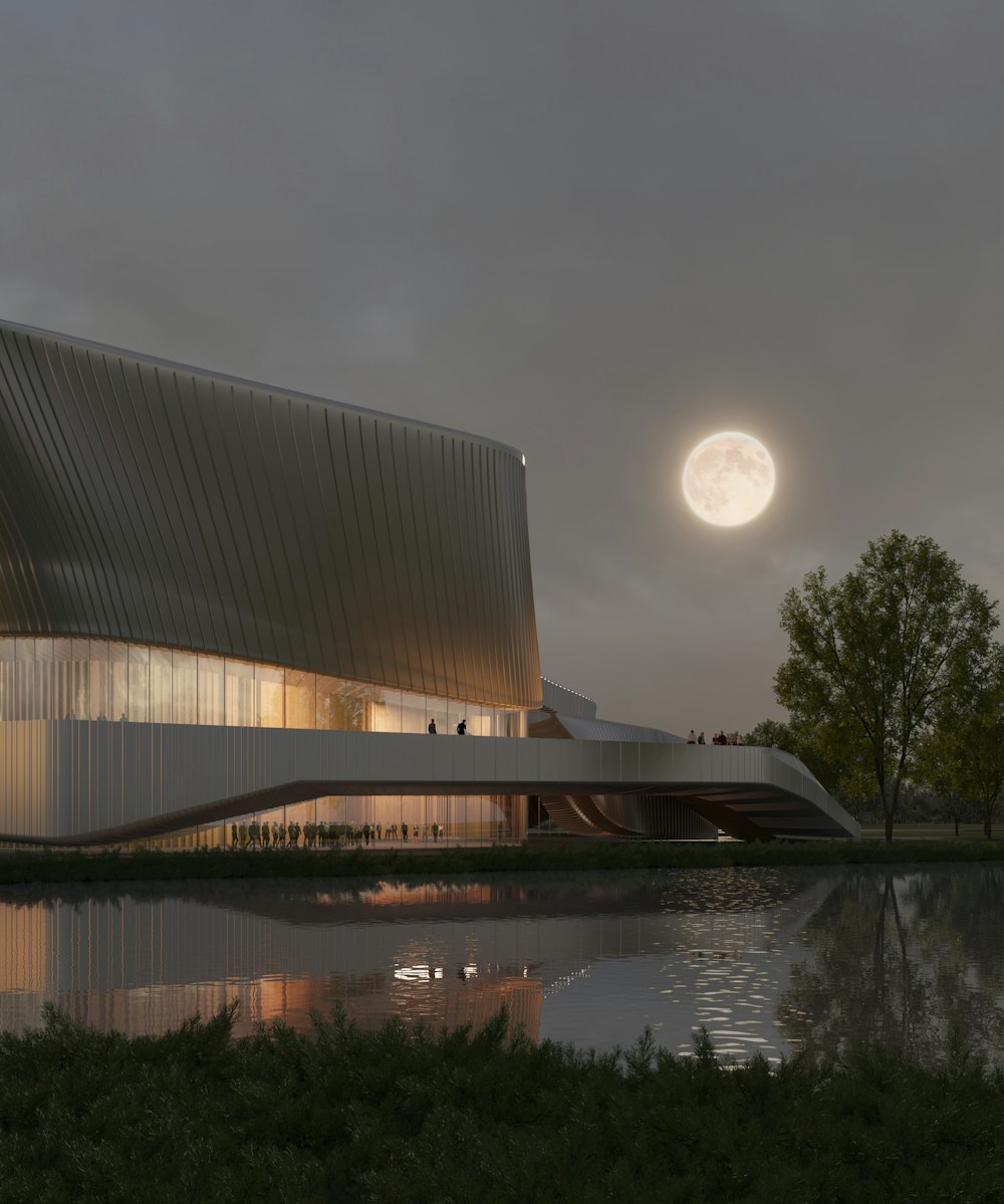 a building with a large moon in the background