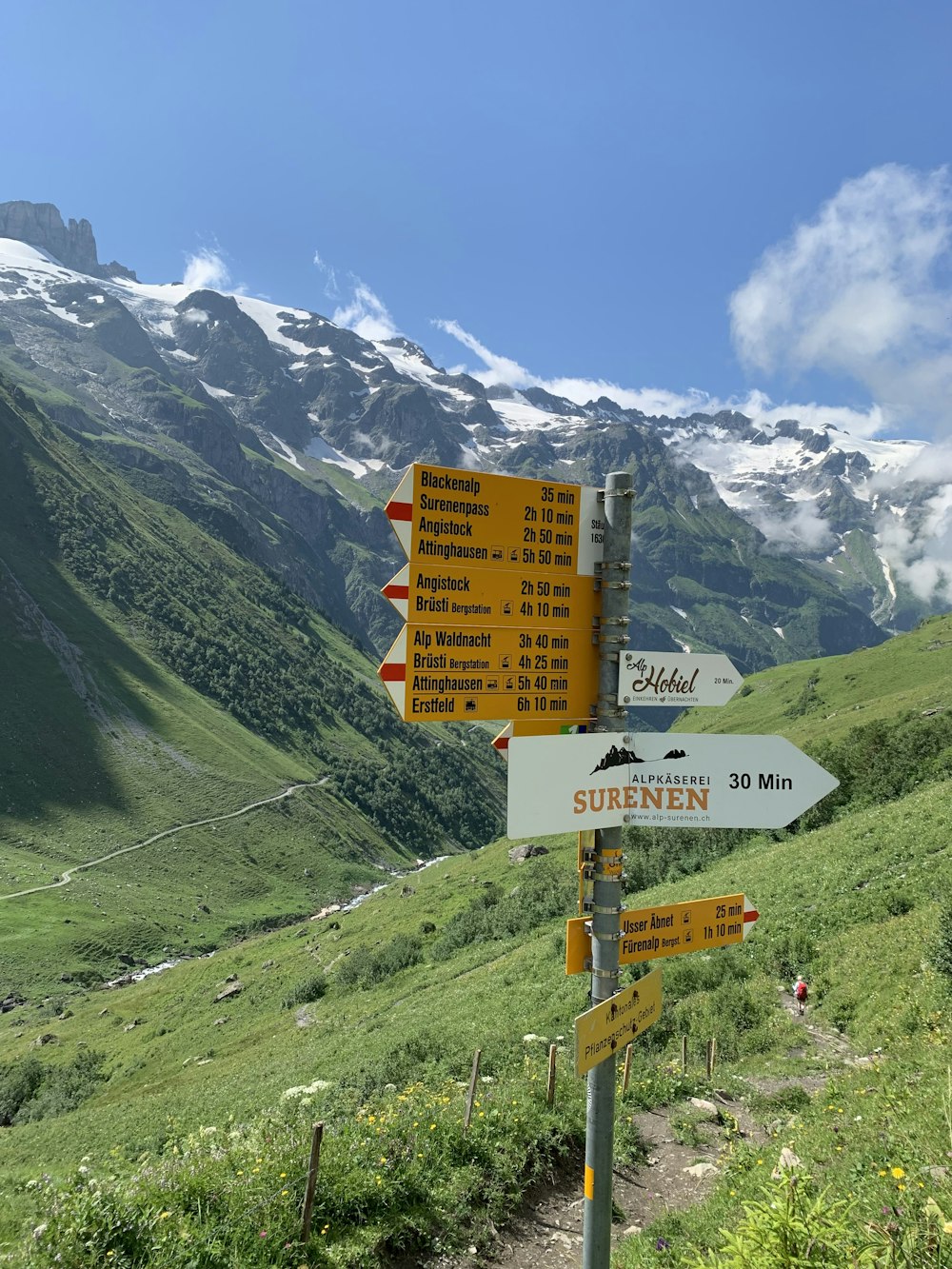 a sign on a mountain