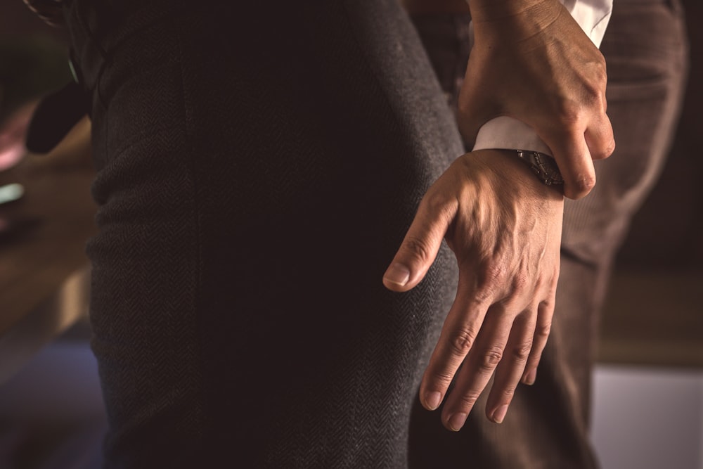 a man and woman holding hands