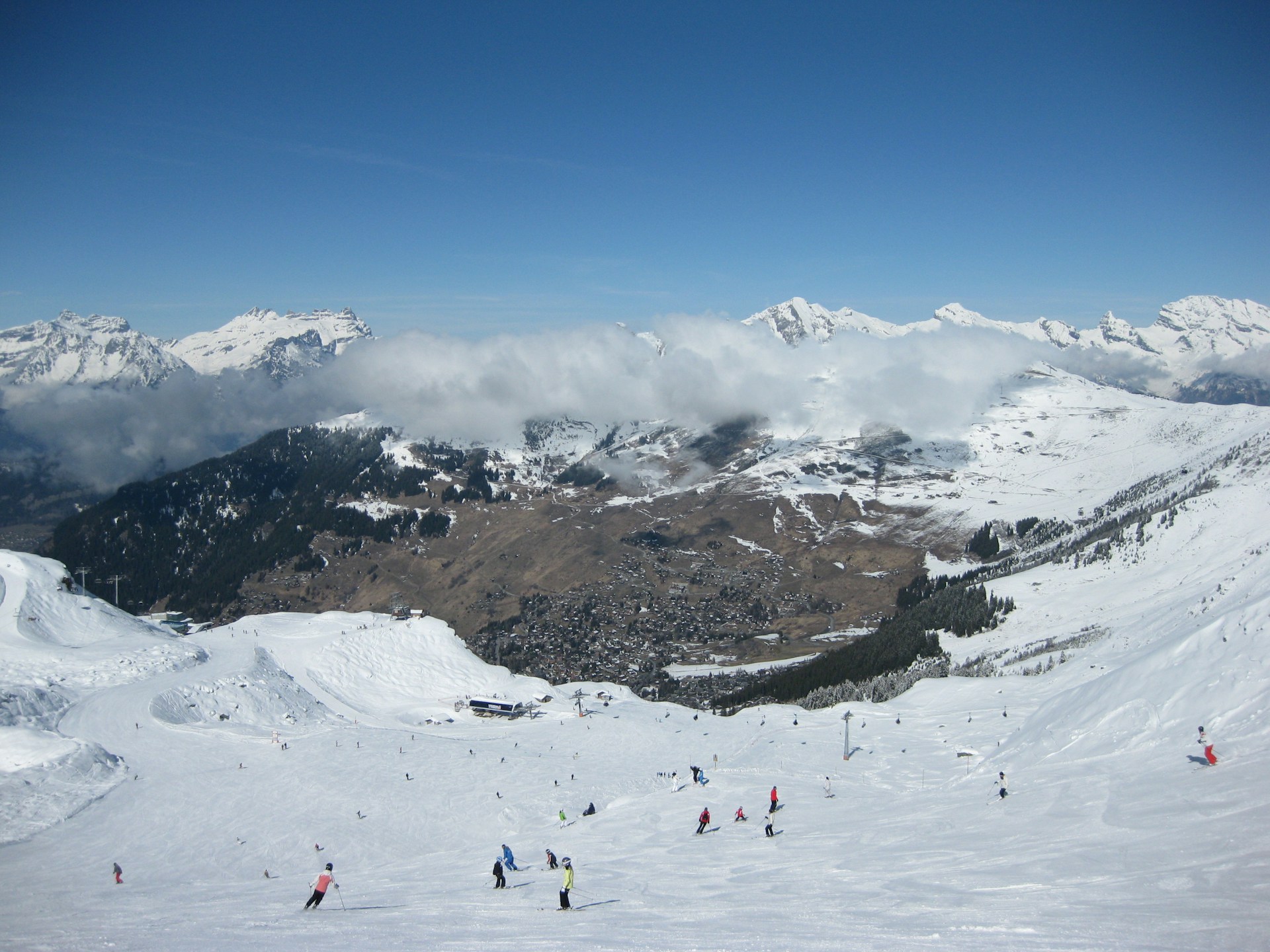 a group of people skiing on a mountain