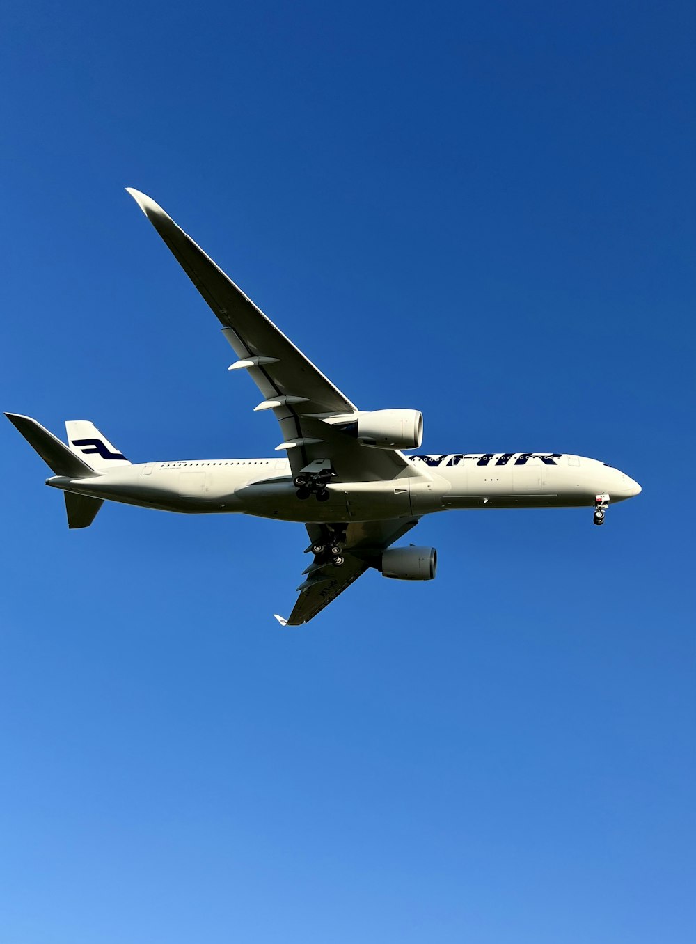 a large airplane flying in the sky