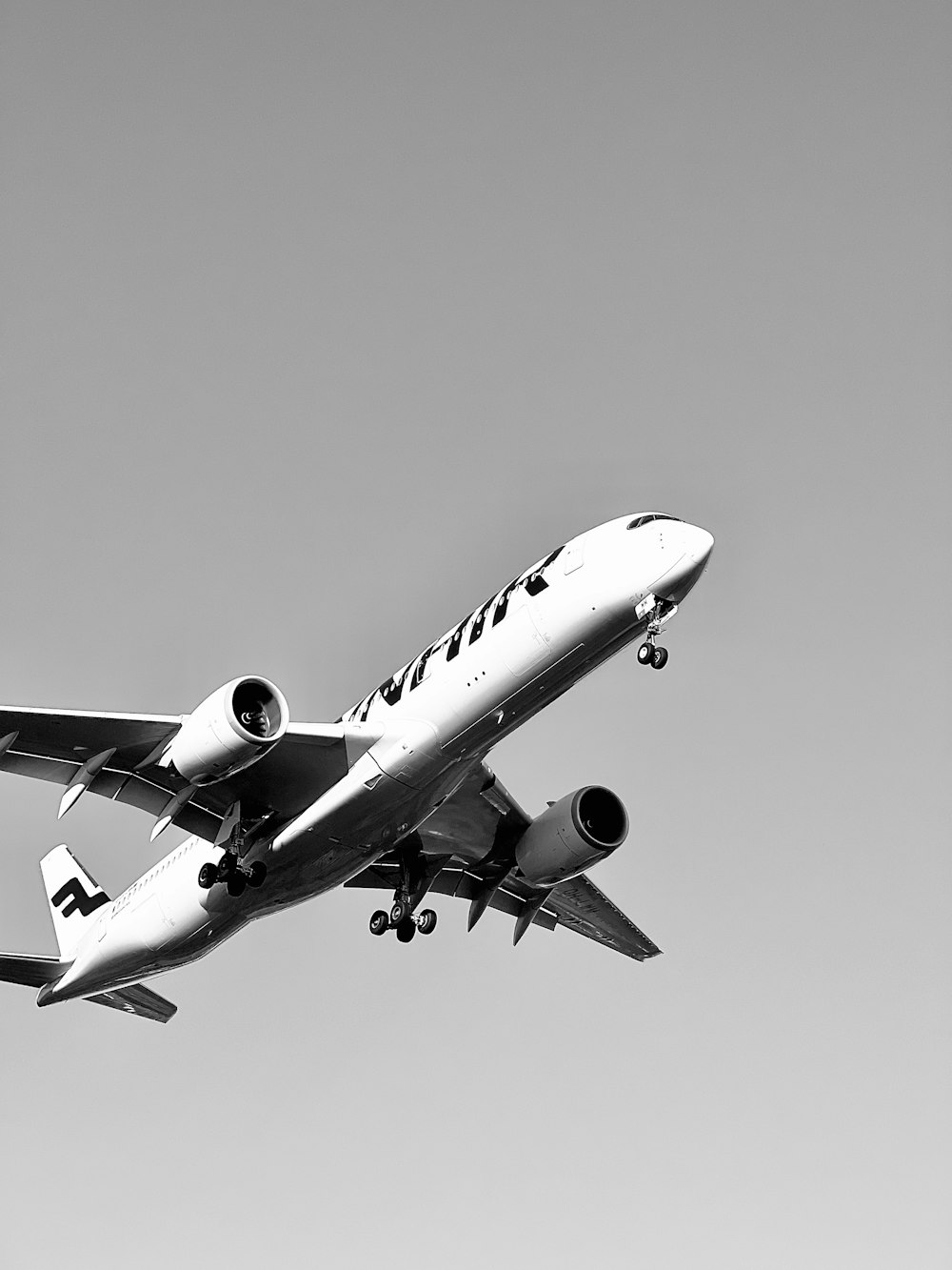 a large airplane flying in the sky