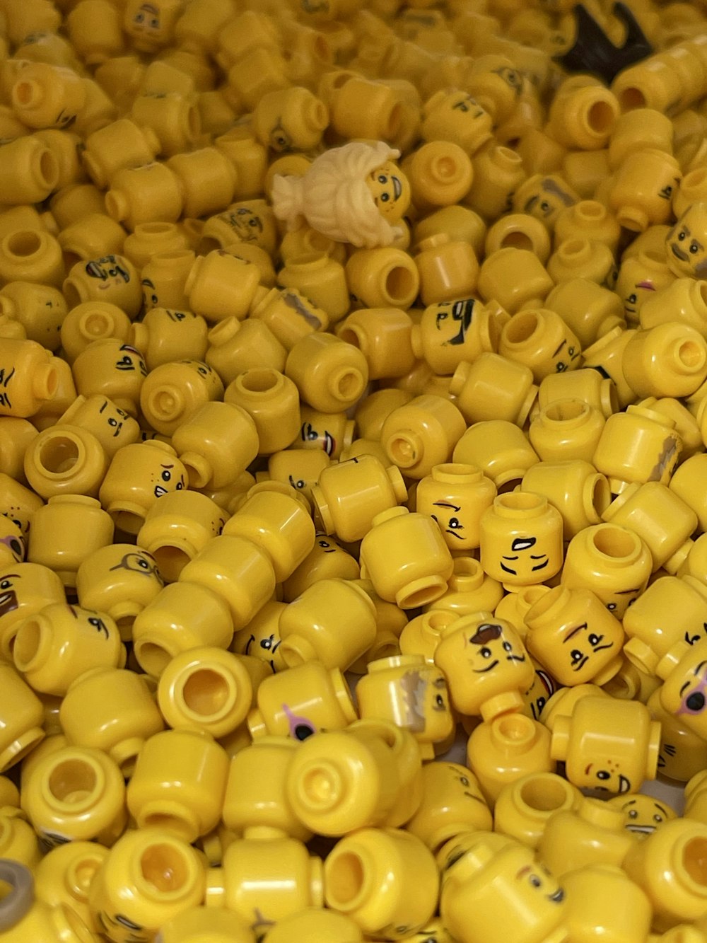 a large pile of yellow rubber ducks