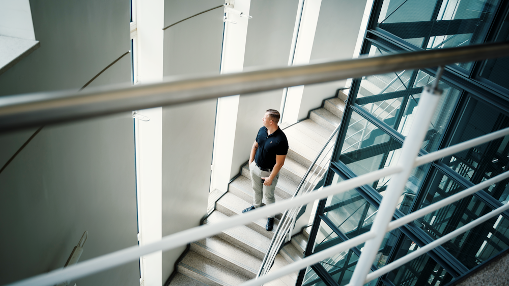 a person walking up a flight of stairs