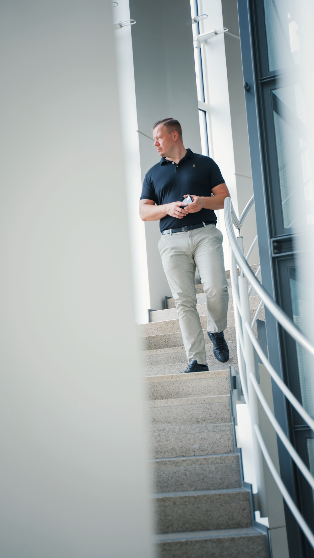 a man standing on a set of stairs