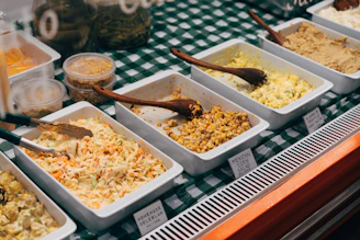 a group of bowls full of food
