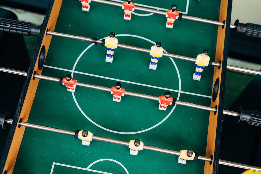 a group of people playing a game,