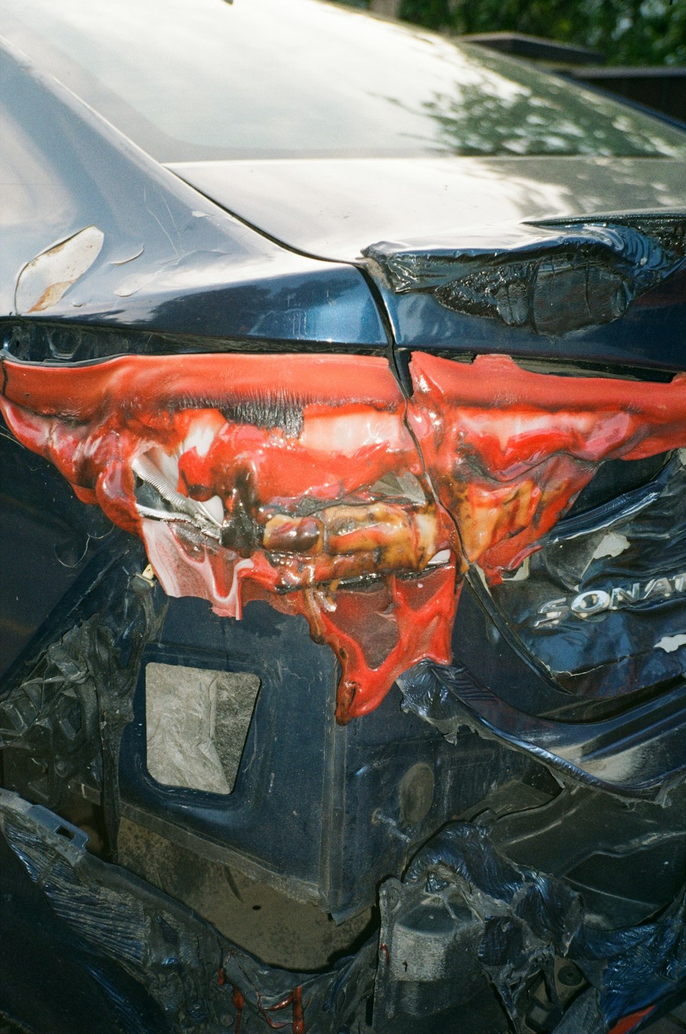 a car with a smashed front end