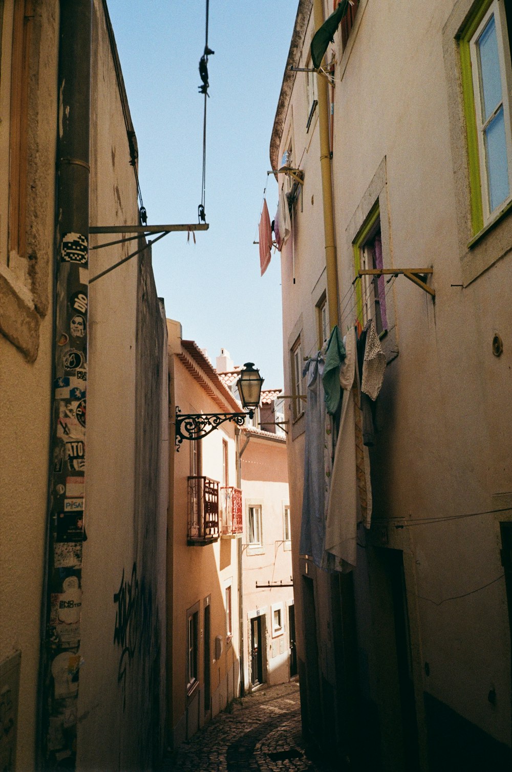 a narrow alley between buildings