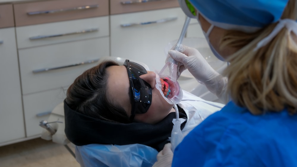 a dentist examining a patient