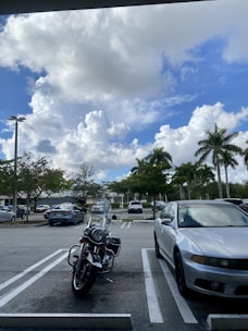A car and bike parked safely, symbolizing vehicle insurance coverage.