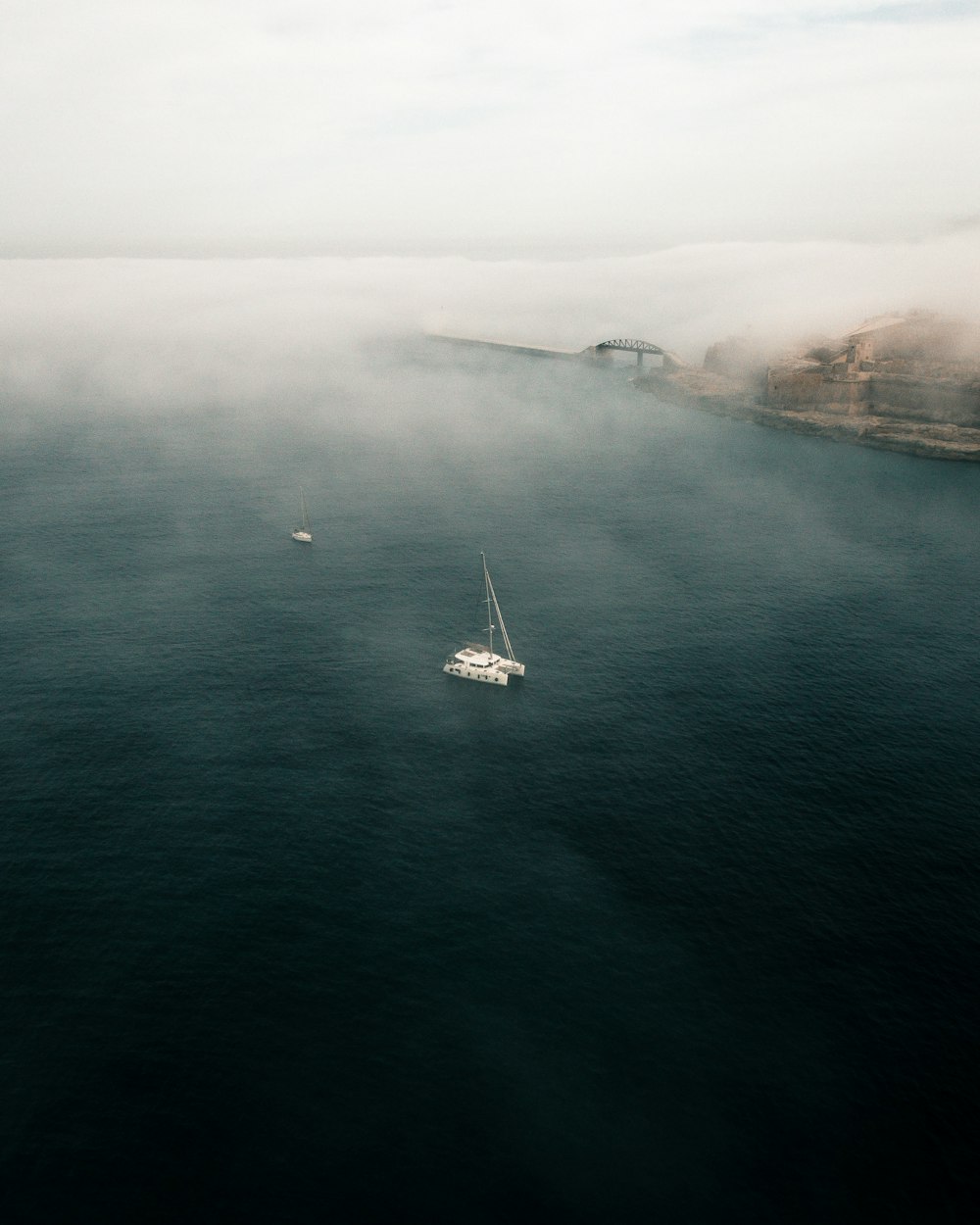 a group of boats on a body of water