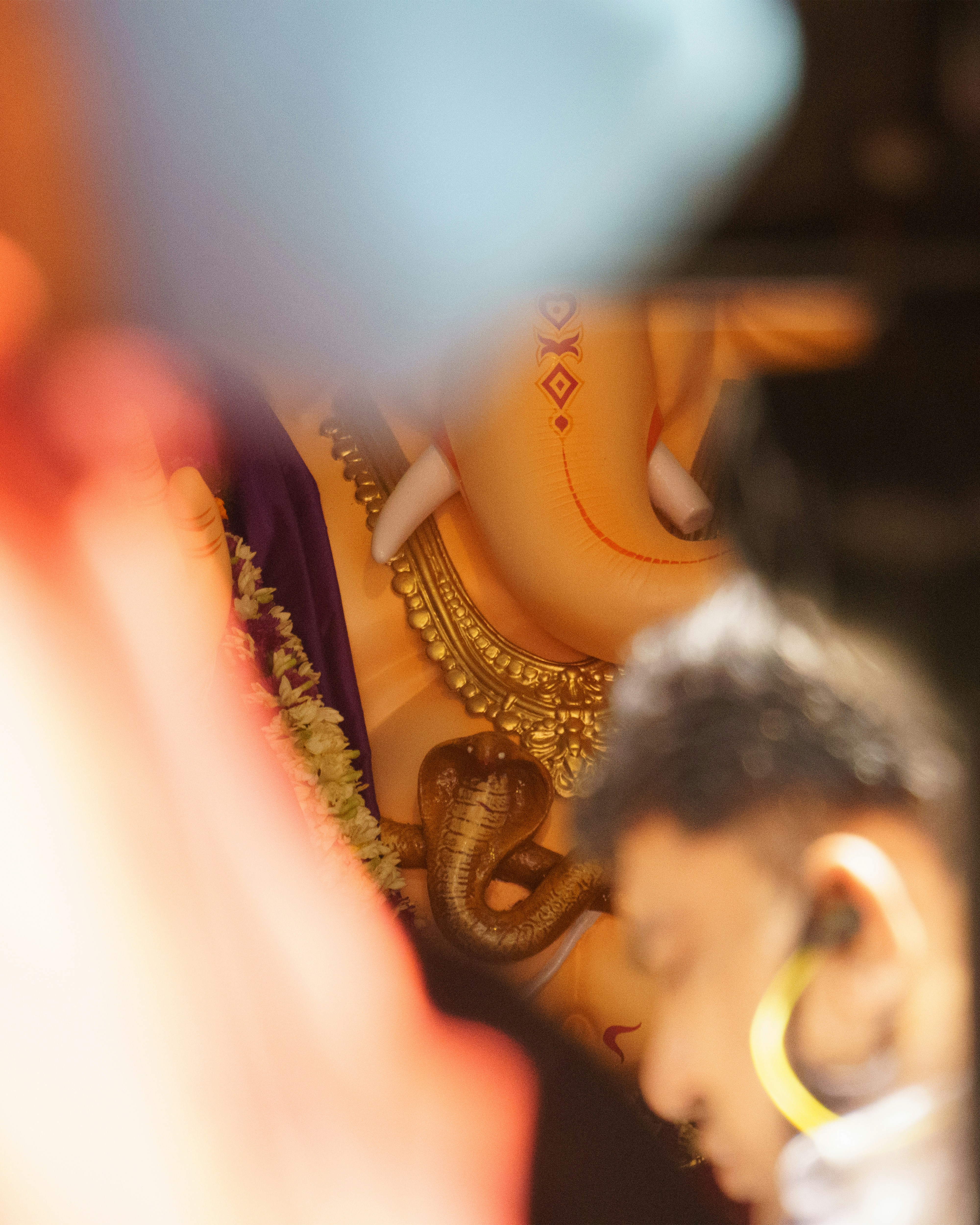 a group of people wearing necklaces