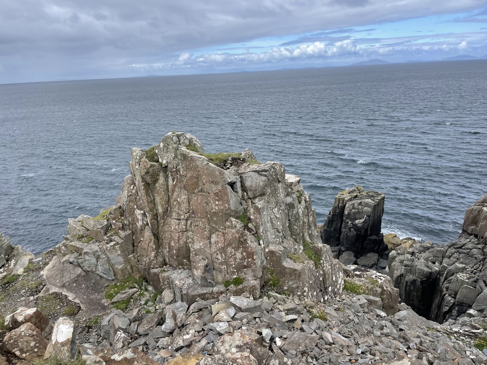 a rocky cliff overlooking the ocean