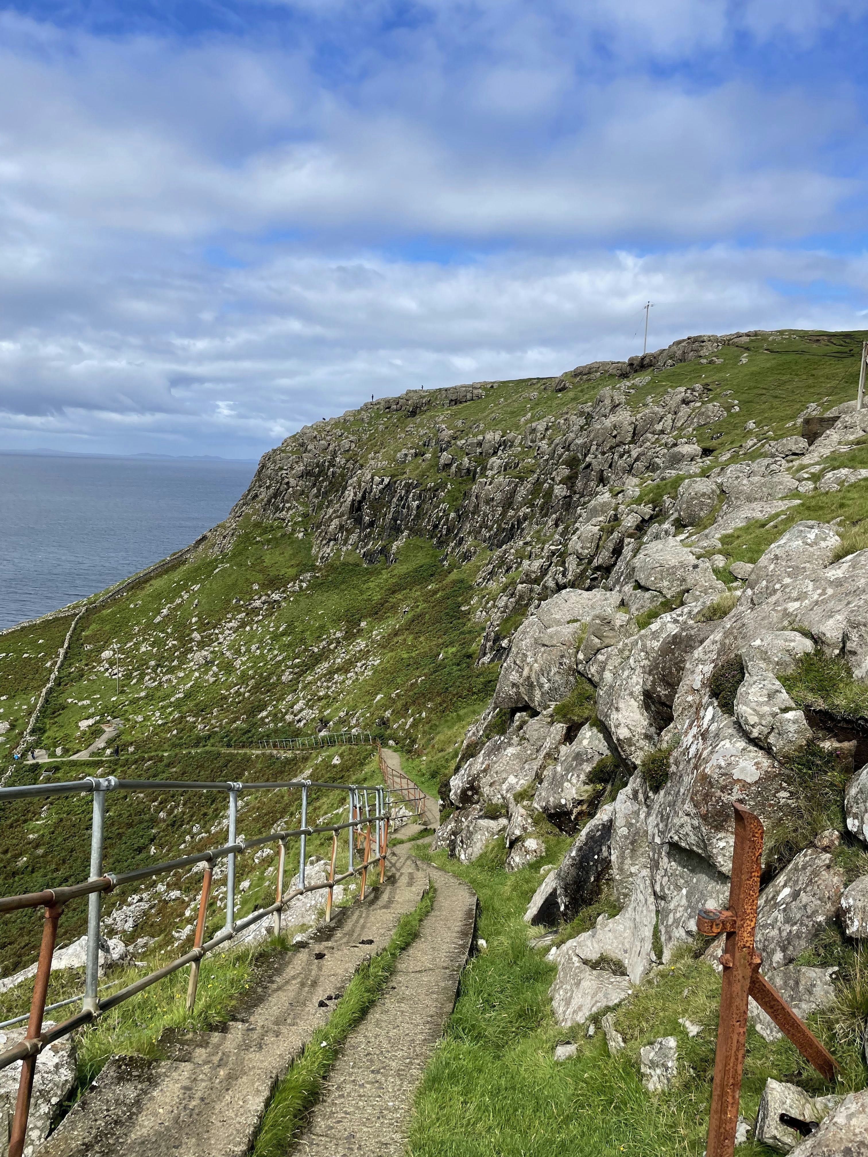 a fence on a cliff