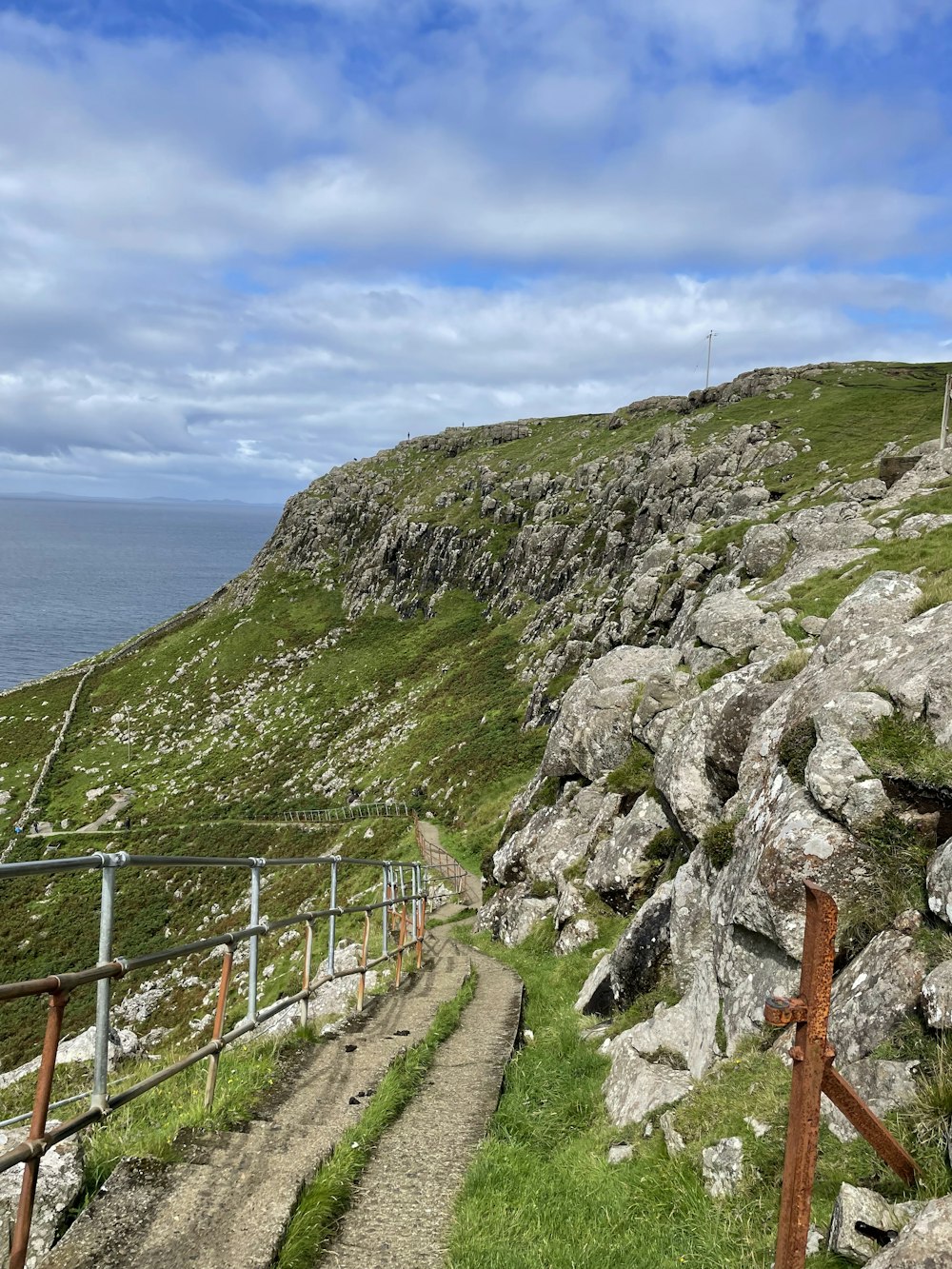 a fence on a cliff