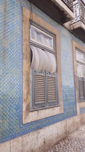 a window with a white cloth from it