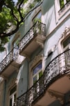 a building with a tree in the front