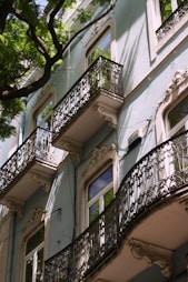 a building with a tree in the front