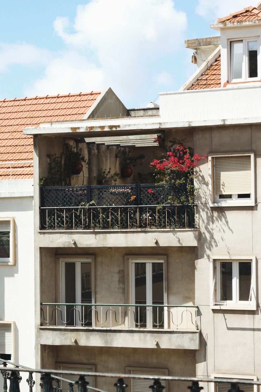 a balcony with flowers on it