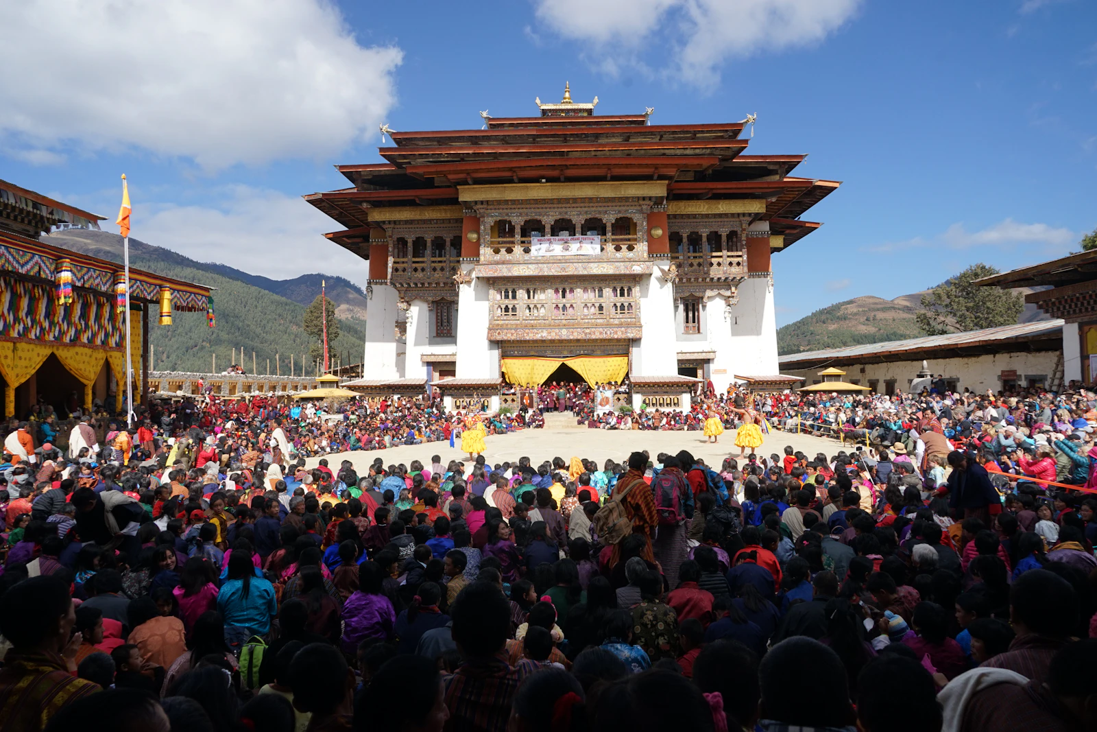 Crowds filling the courtyard of Gangtey Goenpa in Bhutan's Phobjikha valley for the valley's annual crane festival