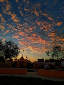 A vibrant sunset over Triveni Sangam, signifying unity.