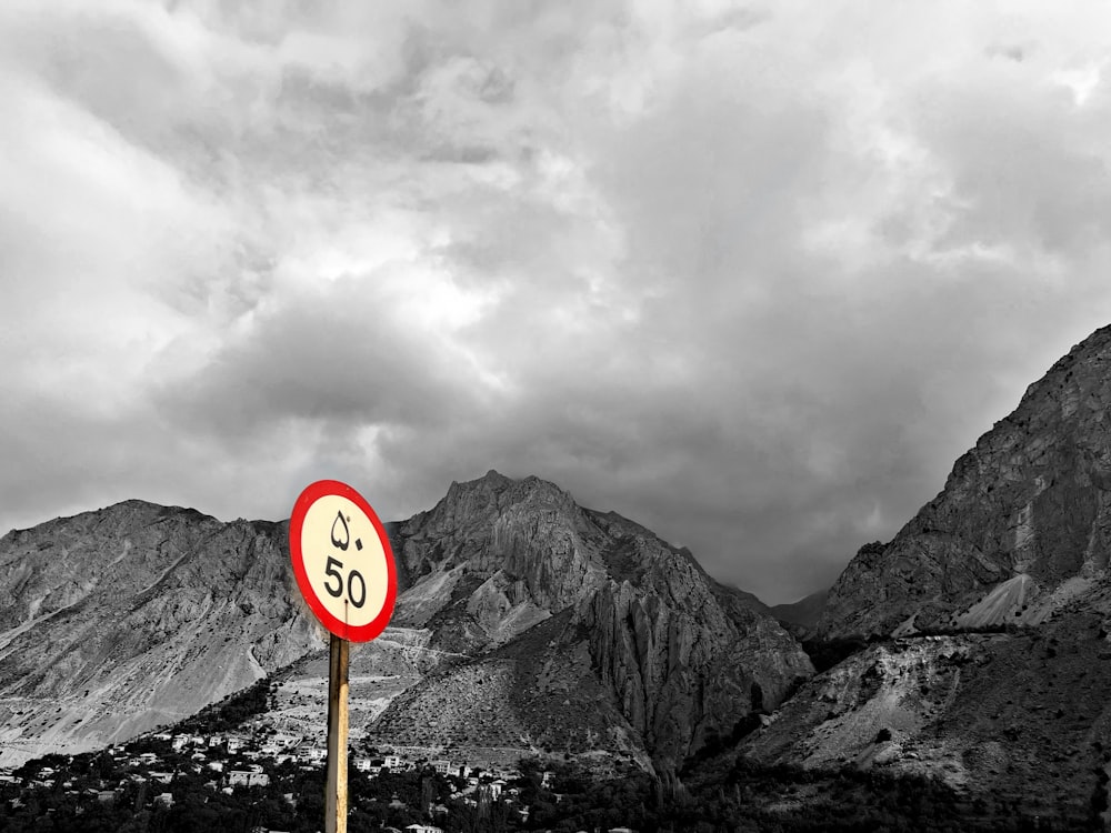 a sign on a mountain