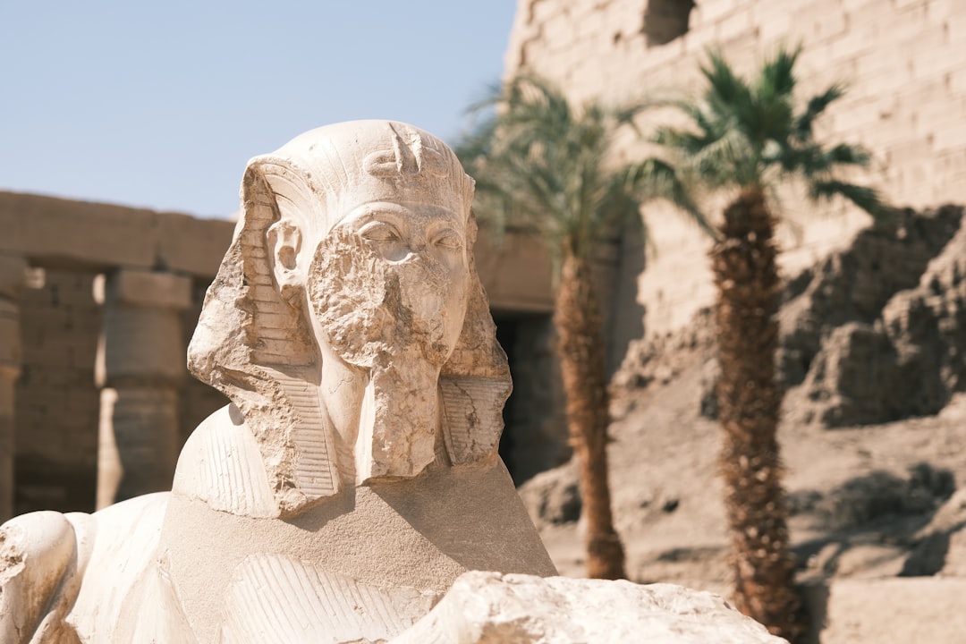 a stone statue of a person,