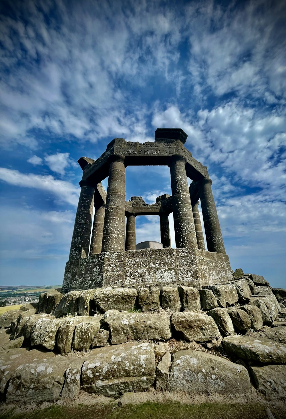 a stone structure with columns