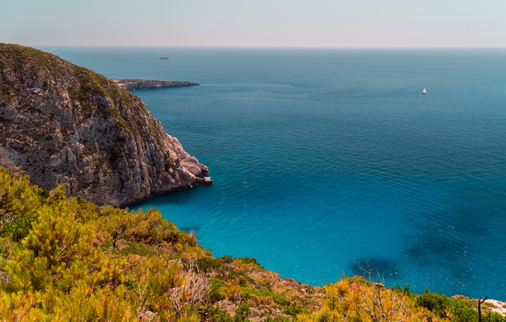 a cliff overlooking a body of water