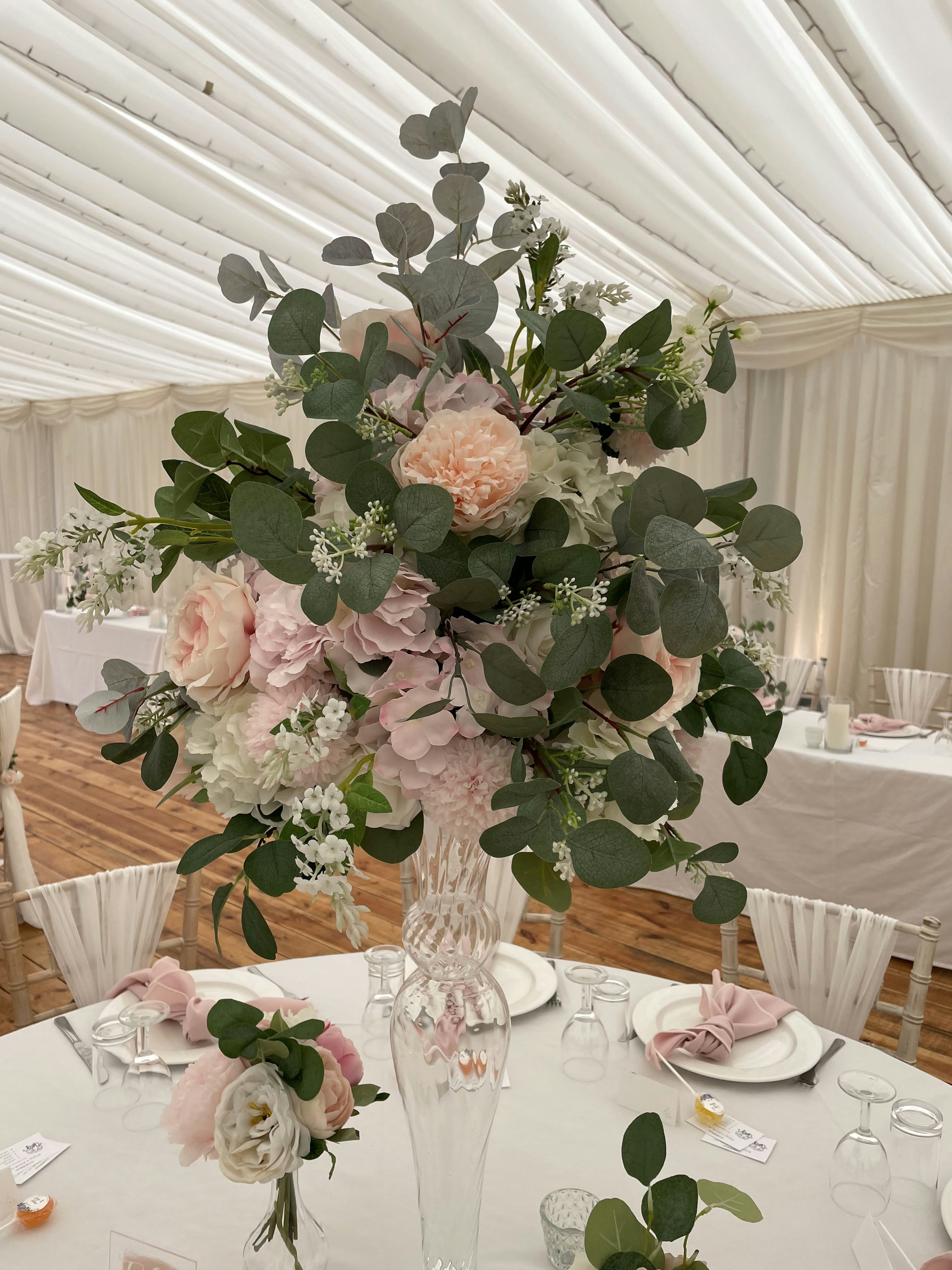 A Pink and peach Bouquet placed on table